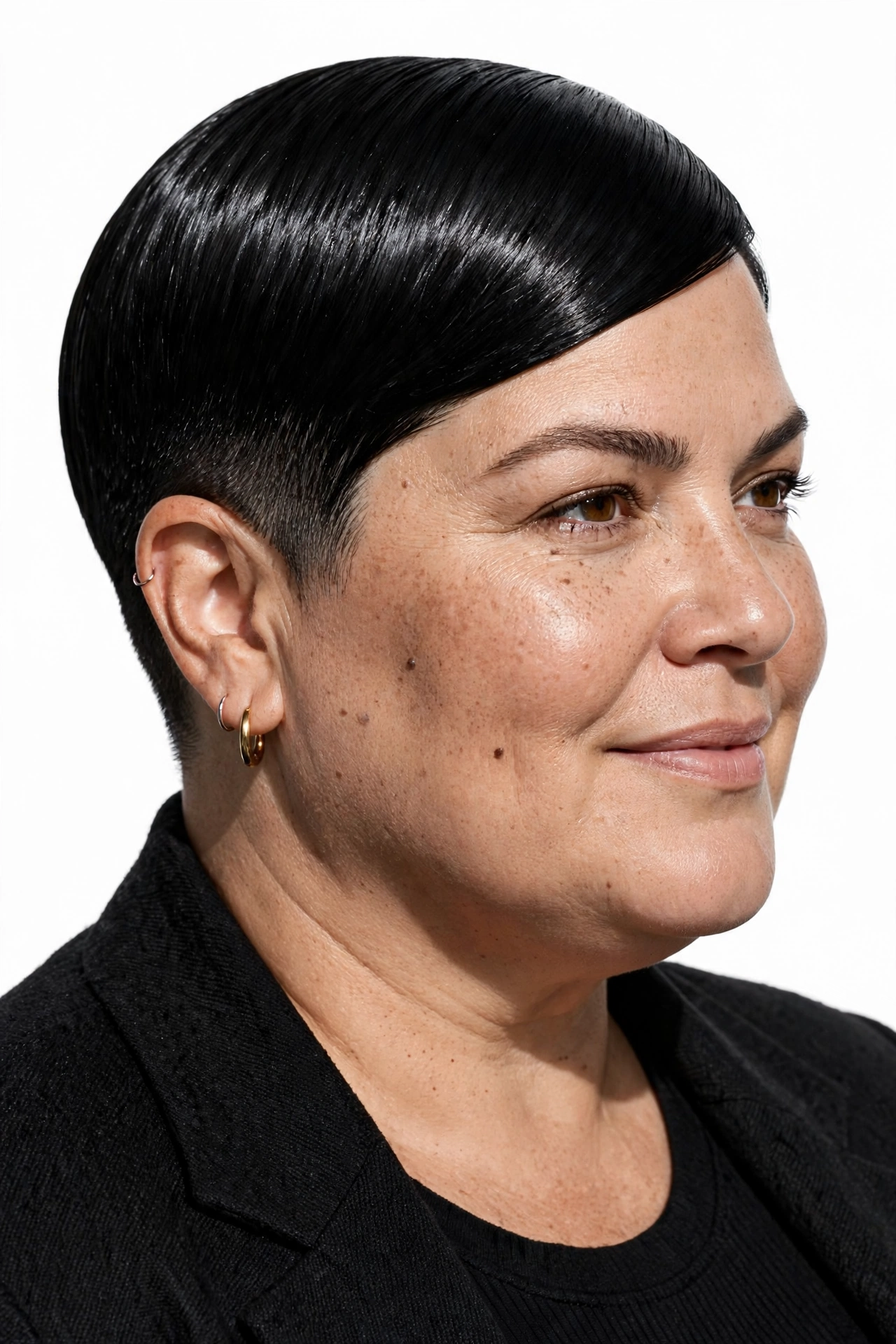 Sleek high-shine jet-black pixie on a plus size woman